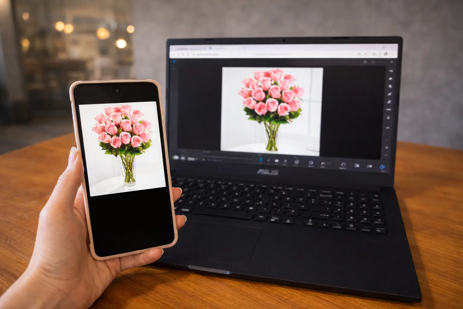 editing product photos on phone and laptop