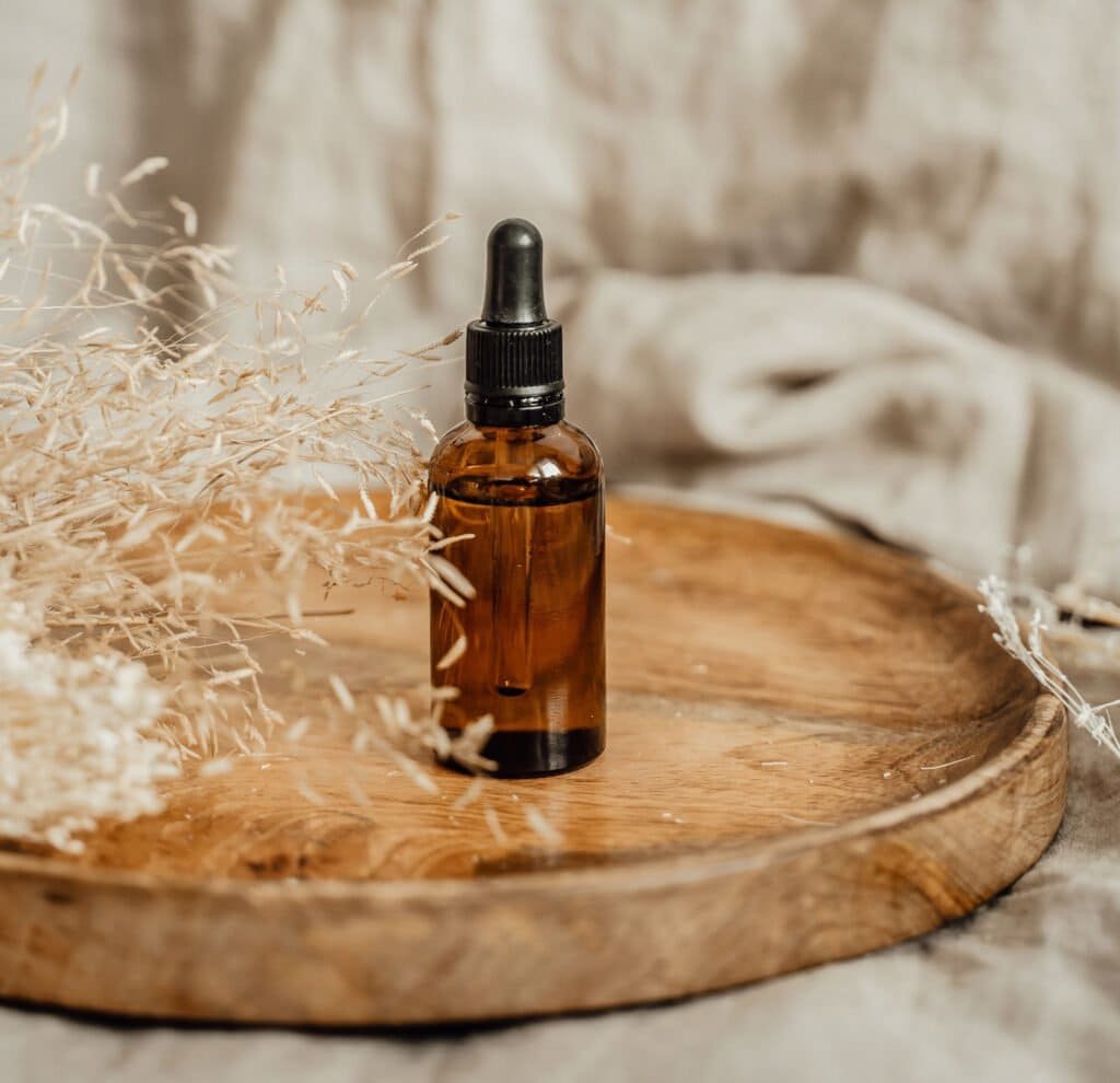 Skincare bottle photographed in good lighting, softly styled in natural tones